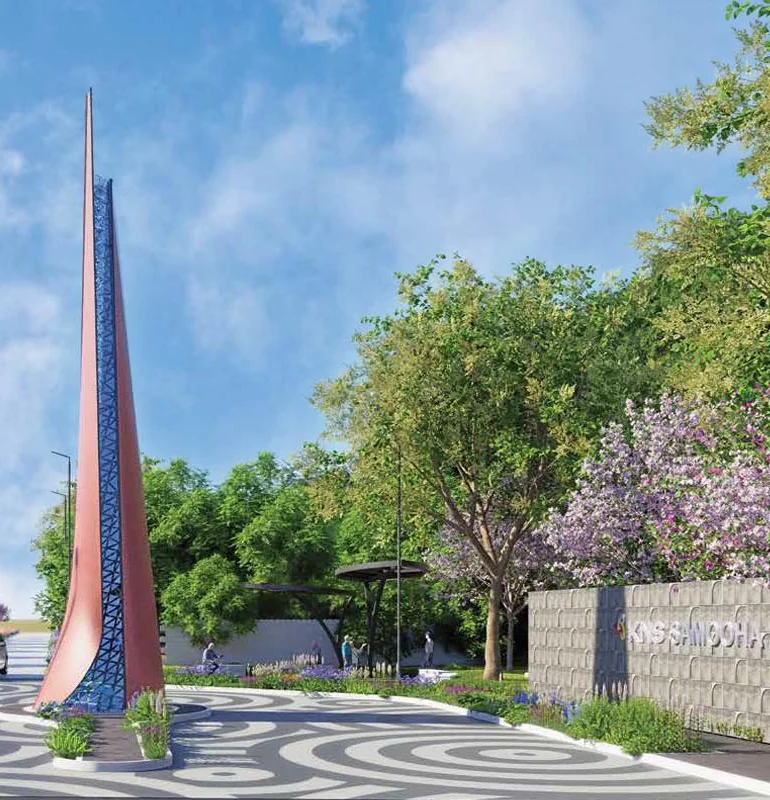 KNS Samooha entrance plaza with a tall sculpted spire and the project name on the gate wall, artist impression