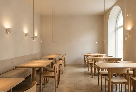 Café with wooden tables, illustrative picture for the clubhouse
